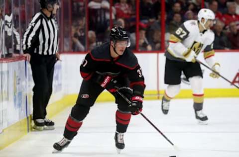 RALEIGH, NC – FEBRUARY 01: Andrei Svechnikov #37 of the Carolina Hurricanes skates with the puck along the boards during an NHL game against the Vegas Golden Knights on February 1, 2019 at PNC Arena in Raleigh, North Carolina. (Photo by Gregg Forwerck/NHLI via Getty Images)