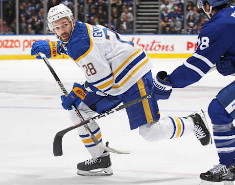 TORONTO, CANADA – MARCH 13: Zemgus Girgensons #28 of the Buffalo Sabres skates against the Toronto Maple Leafs during an NHL game at Scotiabank Arena on March 13, 2023 in Toronto, Ontario, Canada. The Sabres defeated the Maple Leafs 4-3. (Photo by Claus Andersen/Getty Images)