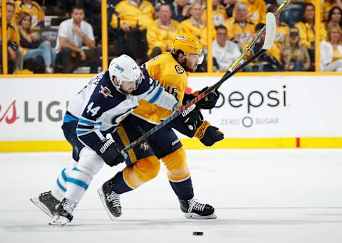 NASHVILLE, TN – MAY 10: Josh Morrissey #44 of the Winnipeg Jets is called for interference against Craig Smith #15 of the Nashville Predators in Game Seven of the Western Conference Second Round during the 2018 NHL Stanley Cup Playoffs at Bridgestone Arena on May 10, 2018 in Nashville, Tennessee. (Photo by John Russell/NHLI via Getty Images)