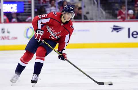 WASHINGTON, DC – December 16: Andre Burakovsky #65 of the Washington Capitals skates with the puck against the Anaheim Ducks. (Photo by Patrick McDermott/NHLI via Getty Images)