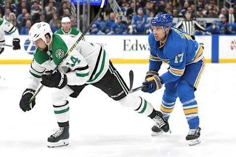 ST. LOUIS, MO – MARCH 02: Dallas Stars leftwing Jamie Benn (14) and St. Louis Blues leftwing Jaden Schwartz (17) go after a loose puck during an NHL game between the Dallas Stars and the St. Louis Blues on March 02, 2019, at Energizer Center, St. Louis, MO. (Photo by Keith Gillett/Icon Sportswire via Getty Images)