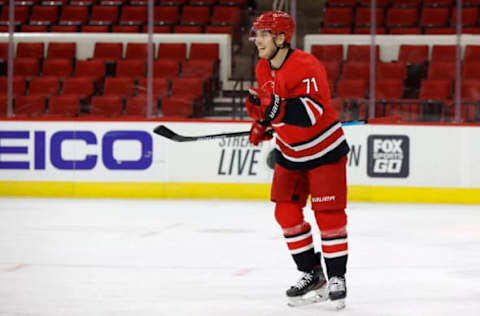 RALEIGH, NORTH CAROLINA – FEBRUARY 22: Jesper Fast #71 of the Carolina Hurricanes celebrates following a goal scored during the first period of their game against the Tampa Bay Lightning at PNC Arena on February 22, 2021, in Raleigh, North Carolina. (Photo by Jared C. Tilton/Getty Images)