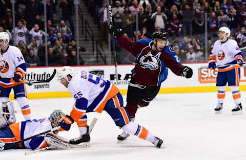 Jan 6, 2017; Denver, CO, USA; Colorado Avalanche center Nathan MacKinnon (29) reacts after scoring the winning goal past New York Islanders goalie Jean-Francois Berube (30) in overtime at the Pepsi Center. The Avalanche defeated the Islanders 2-1 in overtime. Mandatory Credit: Ron Chenoy-USA TODAY Sports