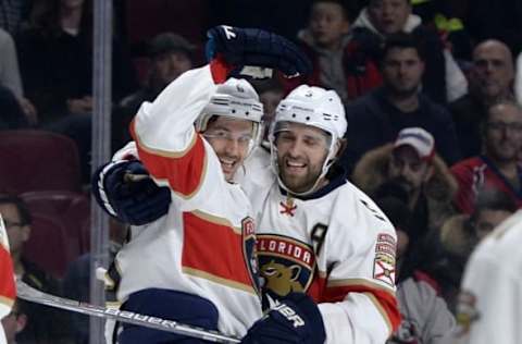 Nov 15, 2016; Montreal, Quebec, CAN; Florida Panthers defenseman Alex Petrovic (6) reacts with teammates after scoring a goal against the Montreal Canadiens during the first period at the Bell Centre. Mandatory Credit: Eric Bolte-USA TODAY Sports