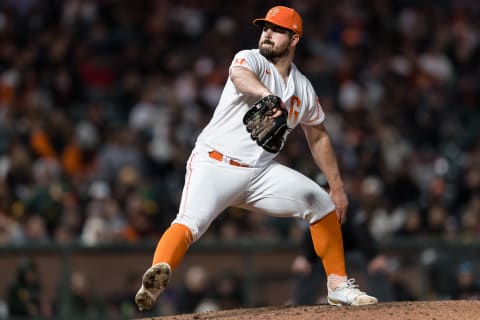 Apr 26, 2022; San Francisco, California, USA; San Francisco Giants starting pitcher Carlos Rodon (16) throws against the Oakland Athletics during the fifth inning at Oracle Park. Mandatory Credit: John Hefti-USA TODAY Sports