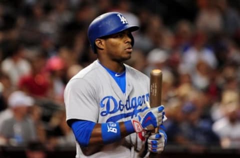 Jul 16, 2016; Phoenix, AZ, USA; Los Angeles Dodgers right fielder Yasiel Puig (66) looks on during the eighth inning against the Arizona Diamondbacks at Chase Field. Mandatory Credit: Matt Kartozian-USA TODAY Sports