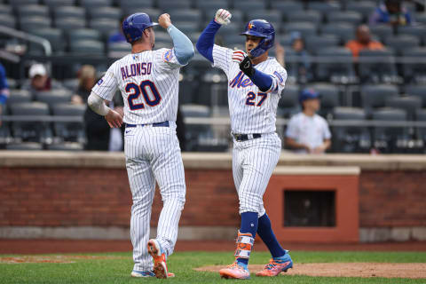 Sep 27, 2023; New York City, New York, USA; New York Mets third baseman Mark Vientos (27) celebrates with first baseman Pete Alonso (20) after hitting a two run home run during the sixth inning against the Miami Marlins at Citi Field. Mandatory Credit: Vincent Carchietta-USA TODAY Sports