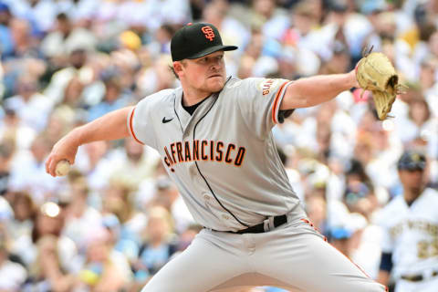 May 27, 2023; Milwaukee, Wisconsin, USA; San Francisco Giants pitcher Logan Webb (62) pitches against the Milwaukee Brewers in the first inning at American Family Field. Mandatory Credit: Benny Sieu-USA TODAY Sports