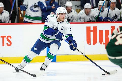 Oct 20, 2022; Saint Paul, Minnesota, USA; Vancouver Canucks center Bo Horvat (53) skates with the puck during the second period against the Minnesota Wild at Xcel Energy Center. Mandatory Credit: Matt Krohn-USA TODAY Sports