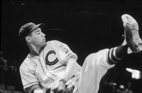 circa 1940: Full-length image of baseball pitcher Bob Feller of the Cleveland Indians winding up for a pitch during practice. (Photo by New York Times Co./Getty Images)