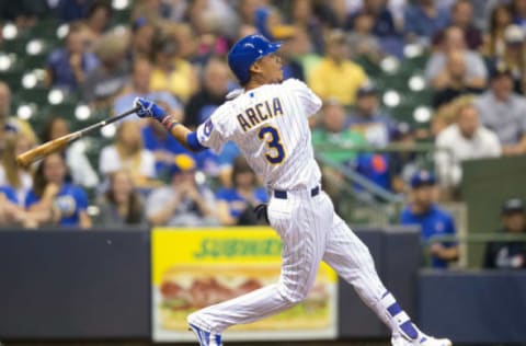 Aug 26, 2016; Milwaukee, WI, USA; Milwaukee Brewers shortstop Orlando Arcia (3) hits a home run during the sixth inning against the Pittsburgh Pirates at Miller Park. Mandatory Credit: Jeff Hanisch-USA TODAY Sports