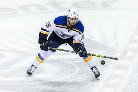 May 25, 2016; San Jose, CA, USA; St. Louis Blues center Robby Fabbri (15) gathers the puck against San Jose Sharks in the first period of game six in the Western Conference Final of the 2016 Stanley Cup Playoffs at SAP Center at San Jose. Mandatory Credit: John Hefti-USA TODAY Sports