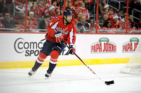 WASHINGTON, DC – JANUARY 22: Roman Hamrlik #44 of the Washington Capitals handles the puck against the Winnipeg Jets at the Verizon Center on January 22, 2013 in Washington, DC. (Photo by Greg Fiume/Getty Images)