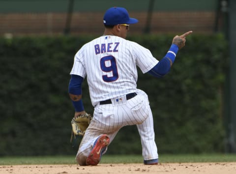 CHICAGO, IL – JULY 21: Javier Baez #9 of the Chicago Cubs reacts after making a play during the ninth inning against the St. Louis Cardinals during game one of a doubleheader on July 21, 2018 at Wrigley Field in Chicago, Illinois. The Cubs won 7-2. (Photo by David Banks/Getty Images)