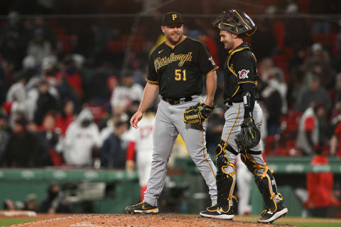 Apr 3, 2023; Boston, Massachusetts, USA; Pittsburgh Pirates catcher Jason Delay (55) reacts with relief pitcher David Bednar (51) after defeating the Boston Red Sox at Fenway Park. Mandatory Credit: Brian Fluharty-USA TODAY Sports