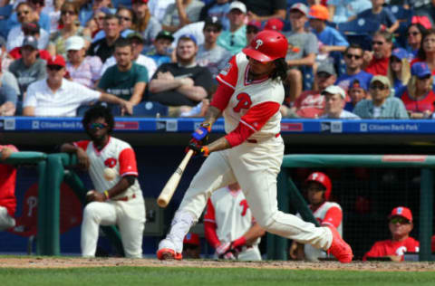 While Galvis Leads with His Glove and His Mouth, Herrera Is Cheering from the Top Step Again. Photo by H. Martin/Getty Images.