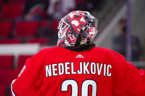 May 1, 2021; Raleigh, North Carolina, USA; Carolina Hurricanes goaltender Alex Nedeljkovic (39) looks up against the Columbus Blue Jackets at PNC Arena. Mandatory Credit: James Guillory-USA TODAY Sports