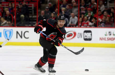 RALEIGH, NC – NOVEMBER 23: Calvin deHaan #44 of the Carolina Hurricanes shoots the puck during an NHL game against the Florida Panthers on November 23, 2018 at PNC Arena in Raleigh, North Carolina. (Photo by Gregg Forwerck/NHLI via Getty Images)