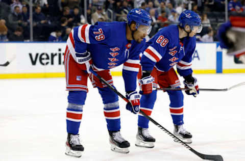 NEW YORK, NEW YORK – MARCH 21: K’Andre Miller #79 and Patrick Kane #88 of the New York Rangers look on during the first period against the Carolina Hurricanes at Madison Square Garden on March 21, 2023, in New York City. (Photo by Sarah Stier/Getty Images)