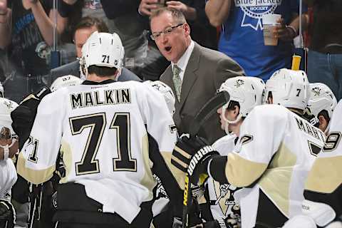 COLUMBUS, OH – APRIL 21: Head Coach Dan Bylsma of the Pittsburgh Penguins talks with his team during a timeout against the Columbus Blue Jackets in Game Three of the First Round of the 2014 Stanley Cup Playoffs on April 21, 2014 at Nationwide Arena in Columbus, Ohio. (Photo by Jamie Sabau/NHLI via Getty Images)