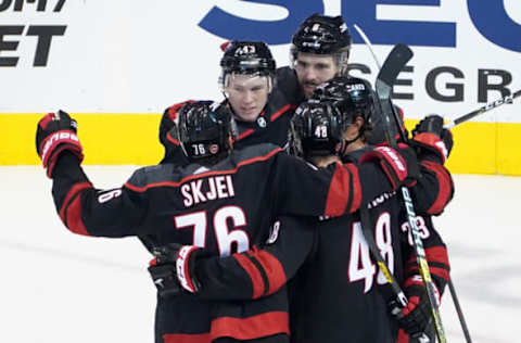 TORONTO, ONTARIO – AUGUST 03: Jordan Martinook #48 of the Carolina Hurricanes celebrates with Morgan Geekie #43, Joel Edmundson #6, and Brady Skjei #76 after scoring a goal against the New York Rangers in Game Two of the Eastern Conference Qualification Round prior to the 2020 NHL Stanley Cup Playoffs at Scotiabank Arena on August 3, 2020 in Toronto, Ontario, Canada. (Photo by Andre Ringuette/Freestyle Photo/Getty Images)