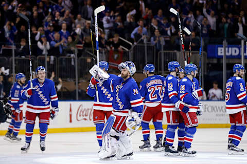 May 4, 2017; New York, NY, USA; New York Rangers goalie Henrik Lundqvist (30) celebrates with teammates after defeating the Ottawa Senators in game four of the second round of the 2017 Stanley Cup Playoffs at Madison Square Garden. Mandatory Credit: Adam Hunger-USA TODAY Sports