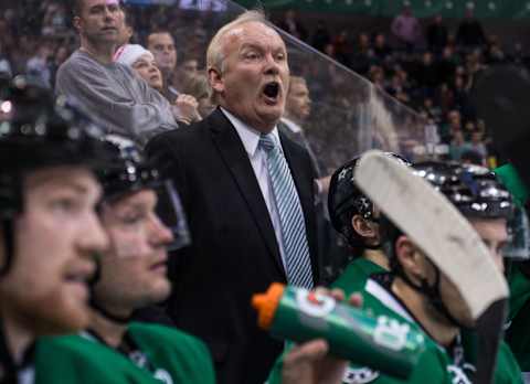 Dec 19, 2013; Dallas, TX, USA; Dallas Stars head coach Lindy Ruff argues a penalty call during the second period against the Vancouver Canucks at the American Airlines Center. Mandatory Credit: Jerome Miron-USA TODAY Sports