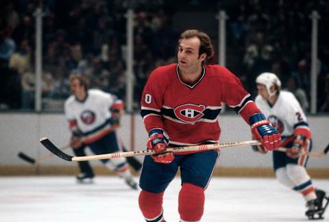 UNIONDALE, NY – CIRCA 1979: Guy Lafleur #10 of the Montreal Canadiens skates against the New York Islanders during an NHL Hockey game circa 1979 at the Nassau Veterans Memorial Coliseum in Uniondale, New York. Lafleur playing career went from 1971-85 and 1988-91. (Photo by Focus on Sport/Getty Images)