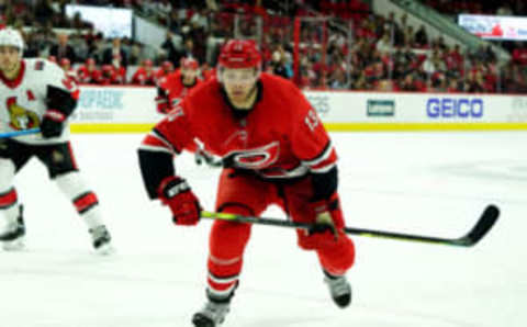 RALEIGH, NC – NOVEMBER 11: Warren Foegele #13 of the Carolina Hurricanes skates for position on the ice during an NHL game against the Ottawa Senators on November 11, 2019 at PNC Arena in Raleigh, North Carolina. (Photo by Gregg Forwerck/NHLI via Getty Images)