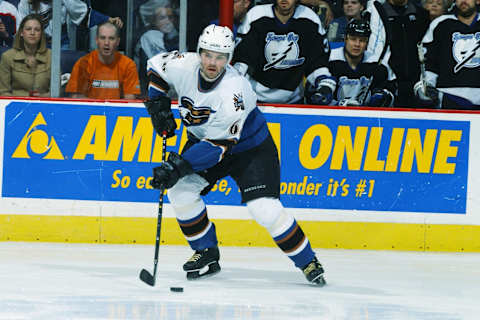 WASHINGTON – APRIL 20: Jaromir Jagr #68 of the Washington Capitals plays the puck against the Tampa Bay Lightning in game six of the first round of the 2003 Eastern Conference Stanley Cup playoffs at the MCI Center on April 20, 2003 in Washington, DC. The Lightning defeated the Capitals 2-1. (Photo by Mitchell Layton/Getty Images/NHLI)