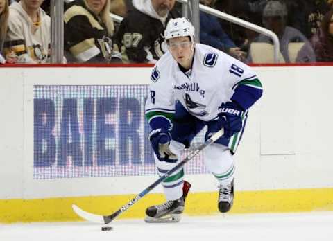 Jan 23, 2016; Pittsburgh, PA, USA; Vancouver Canucks right wing Jake Virtanen (18) skates with the puck against the Pittsburgh Penguins during the third period at the CONSOL Energy Center. The Penguins won 5-4. Mandatory Credit: Charles LeClaire-USA TODAY Sports