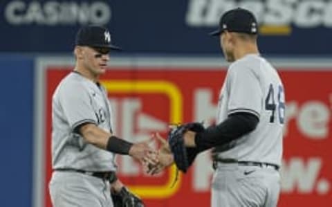 Two Yankees veterans near return but fans only want one of them back