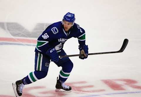 Sep 23, 2014; Vancouver, British Columbia, CAN; Vancouver Canucks center Alex Friesen (56) skates against the San Jose Sharks during the third period at Rogers Arena. The Vancouver Canucks won 4-2. Mandatory Credit: Anne-Marie Sorvin-USA TODAY Sport