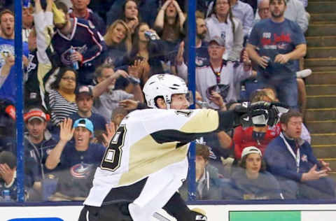 COLUMBUS, OH – APRIL 21: James Neal #18 of the Pittsburgh Penguins celebrates after Jussi Jokinen #36 of the Pittsburgh Penguins scored the game winning goal against the Columbus Blue Jackets in Game Three of the First Round of the 2014 NHL Stanley Cup Playoffs at Nationwide Arena on April 21, 2014 in Columbus, Ohio. Pittsburgh defeated Columbus 4-3. (Photo by Kirk Irwin/Getty Images)