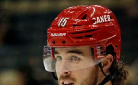 Dec 22, 2022; Pittsburgh, Pennsylvania, USA; Carolina Hurricanes defenseman Dylan Coghlan (15) looks on during warm ups before the game against the Pittsburgh Penguins at PPG Paints Arena. Mandatory Credit: Charles LeClaire-USA TODAY Sports