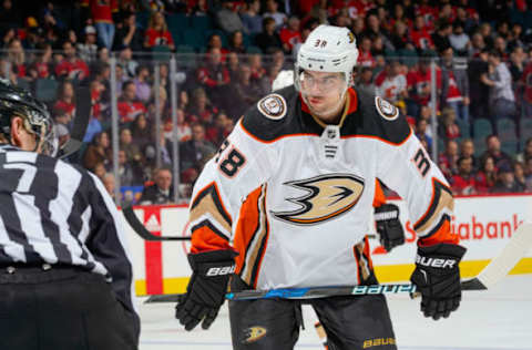 CALGARY, AB – MARCH 21: Derek Grant #38 of the Anaheim Ducks at the face off in an NHL game on March 21, 2018, at the Scotiabank Saddledome in Calgary, Alberta, Canada. (Photo by Gerry Thomas/NHLI via Getty Images)