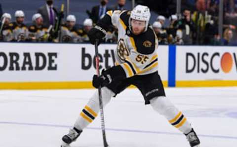 Jun 5, 2021; Uniondale, New York, USA; Boston Bruins defenseman Jeremy Lauzon (55) shoots the puck against the New York Islanders during the third period in game four of the second round of the 2021 Stanley Cup Playoffs at Nassau Veterans Memorial Coliseum. Mandatory Credit: Dennis Schneidler-USA TODAY Sports