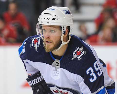 CALGARY, AB – OCTOBER 7: Toby Enstrom #39 of the Winnipeg Jets in action (Photo by Derek Leung/Getty Images)