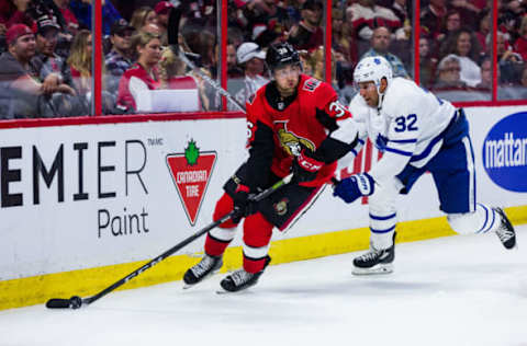 OTTAWA, ON – SEPTEMBER 18: Ottawa Senators center Colin White (36) skates the puck out from behind the net with Toronto Maple Leafs left wing Josh Leivo (32) giving chase during third period National Hockey League preseason action between the Toronto Maple Leafs and Ottawa Senators on September 18, 2017, at Canadian Tire Centre in Ottawa, ON, Canada. (Photo by Richard A. Whittaker/Icon Sportswire via Getty Images)