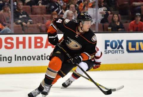 Mar 14, 2016; Anaheim, CA, USA;Anaheim Ducks defenseman Cam Fowler (4) skates with the puck against the New Jersey Devils at Honda Center. The Ducks won 7-1. Mandatory Credit: Kirby Lee-USA TODAY Sports