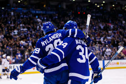 TORONTO, ON – APRIL 2: William Nylander #29 of the Toronto Maple Leafs celebrates his goal on the Buffalo Sabres with teammates Auston Matthews #34 during the second period at the Air Canada Centre on April 2, 2018 in Toronto, Ontario, Canada. (Photo by Kevin Sousa/NHLI via Getty Images)