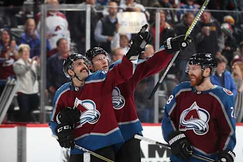 DENVER, CO – NOVEMBER 14: Erik Johnson #6 and Mark Barberio #44 of the Colorado Avalanche point to the crowd after a win against the Boston Bruins at the Pepsi Center on November 14, 2018 in Denver, Colorado. The Avalanche defeated the Bruins 6-3. (Photo by Michael Martin/NHLI via Getty Images)