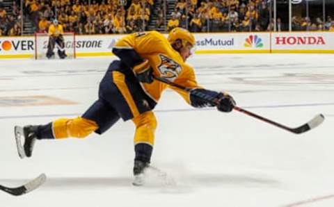 NASHVILLE, TENNESSEE – APRIL 20: Mikael Granlund #64 of the Nashville Predators fires a shot against the Dallas Stars during Game Five of the Western Conference First Round during the 2019 NHL Stanley Cup Playoffs at Bridgestone Arena on April 20, 2019 in Nashville, Tennessee. (Photo by Frederick Breedon/Getty Images)