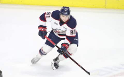 LONDON, ON – MARCH 09: Cole Perfetti #91 of the Saginaw Spirit controls the puck as he skates in the third period during OHL game action against the London Knights at Budweiser Gardens on March 9, 2019 in London, Canada. (Photo by Tom Szczerbowski/Getty Images)