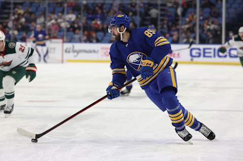 Mar 4, 2022; Buffalo, New York, USA; Buffalo Sabres right wing Alex Tuch (89) looks to make a pass during the second period against the Minnesota Wild at KeyBank Center. Mandatory Credit: Timothy T. Ludwig-USA TODAY Sports