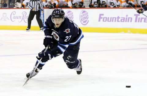 Nov 7, 2015; Winnipeg, Manitoba, CAN; Winnipeg Jets left wing Nikolaj Ehlers (27) looks to get a pass during the first period against the Philadelphia Flyers at MTS Centre. Mandatory Credit: Bruce Fedyck-USA TODAY Sports