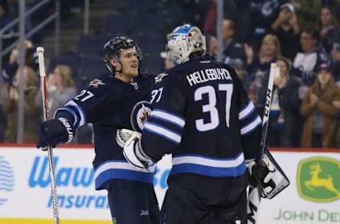 Nov 8, 2016; Winnipeg, Manitoba, CAN; Winnipeg Jets left wing Nikolaj Ehlers (27) celebrates his team