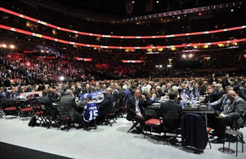 NHL Entry Draft: General view of team executives on the arena floor in the first round of the 2015 NHL Draft at BB&T Center. Mandatory Credit: Steve Mitchell-USA TODAY Sports