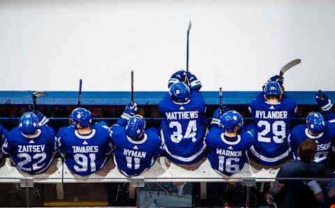 TORONTO, ON – MARCH 25:  Auston Matthews #34, Mitch Marner #16, William Nylander #29, of the Toronto Maple Leafs sit on the bench. (Photo by Mark Blinch/NHLI via Getty Images)