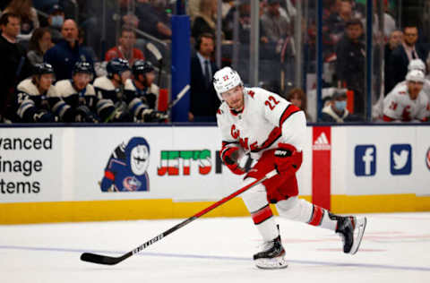 COLUMBUS, OH – OCTOBER 23: Brett Pesce #22 of the Carolina Hurricanes skates after the puck during the game against the Columbus Blue Jackets at Nationwide Arena on October 23, 2021, in Columbus, Ohio. (Photo by Kirk Irwin/Getty Images)